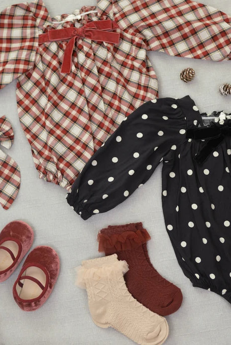 Styled flat lay of Noralee Holiday Ruffle Socks | Pearl, Ruby