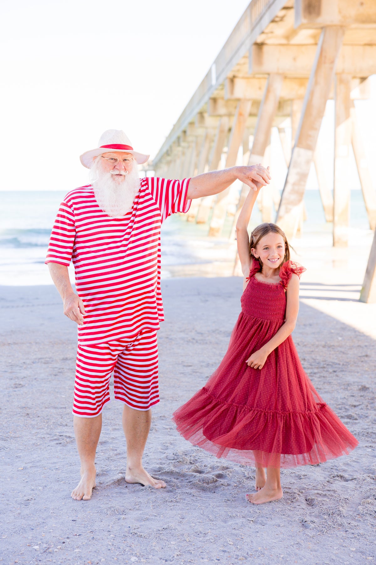 santa spinning girl in Noralee Ruby Dress