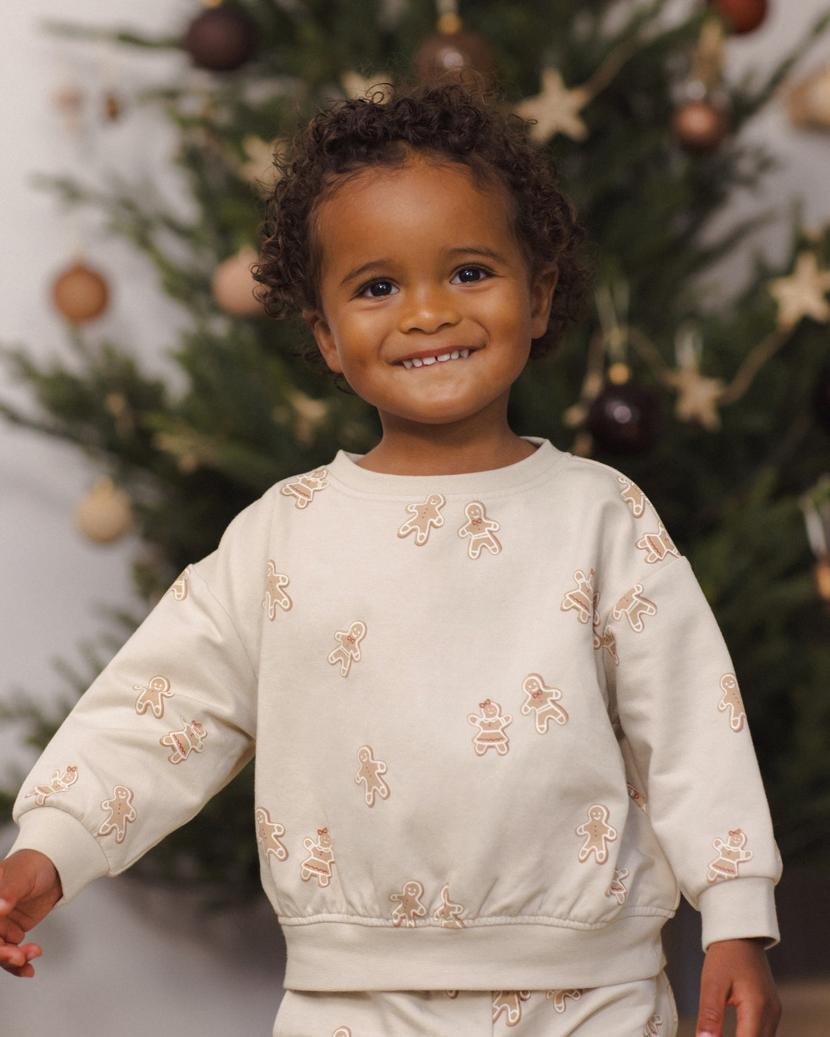 Quincy Mae Relaxed Fleece Baby Sweatshirt in Gingerbread lifestyle model portrait