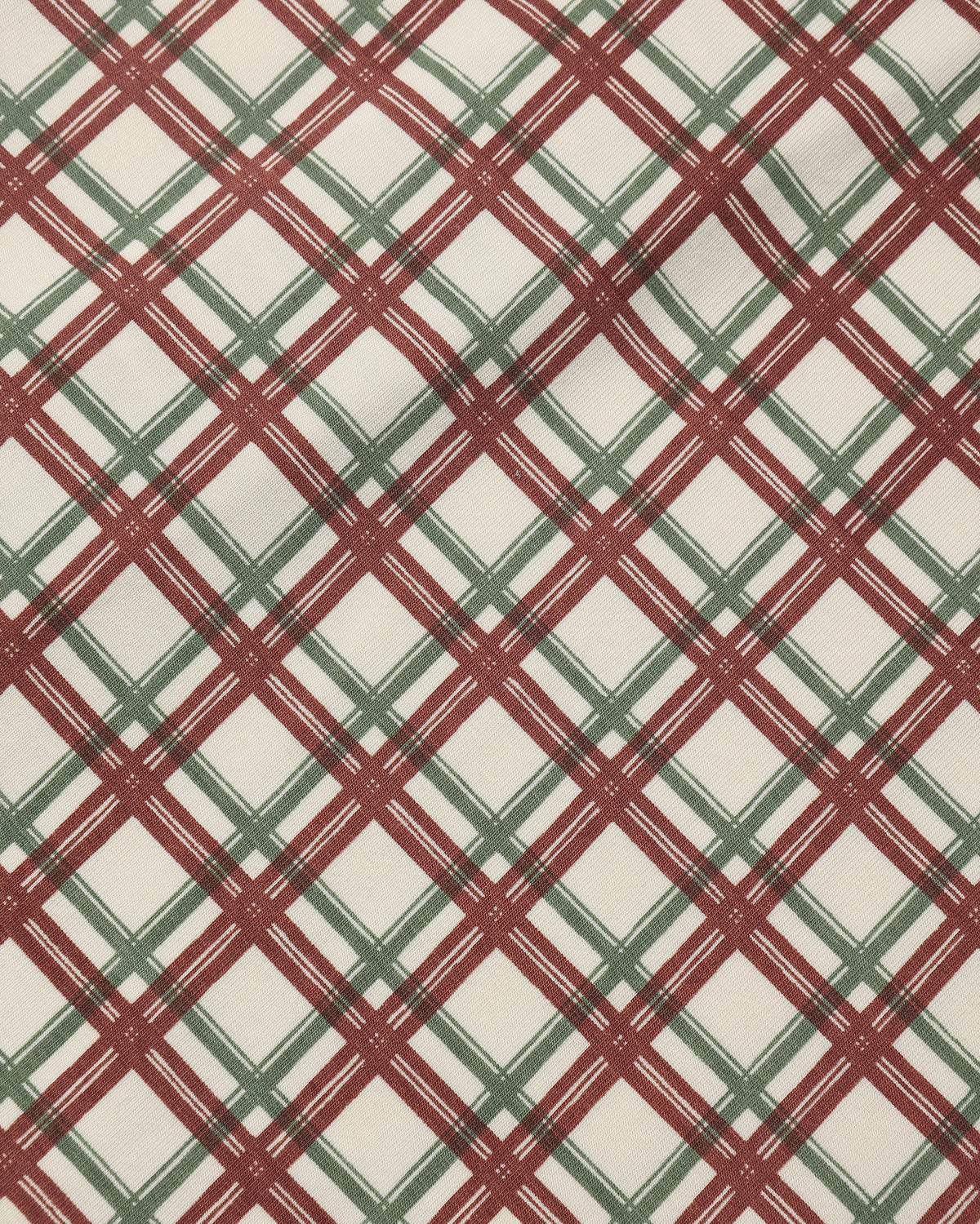 Close up details photo of Quincy Mae AW26 "Redwood Check" pattern