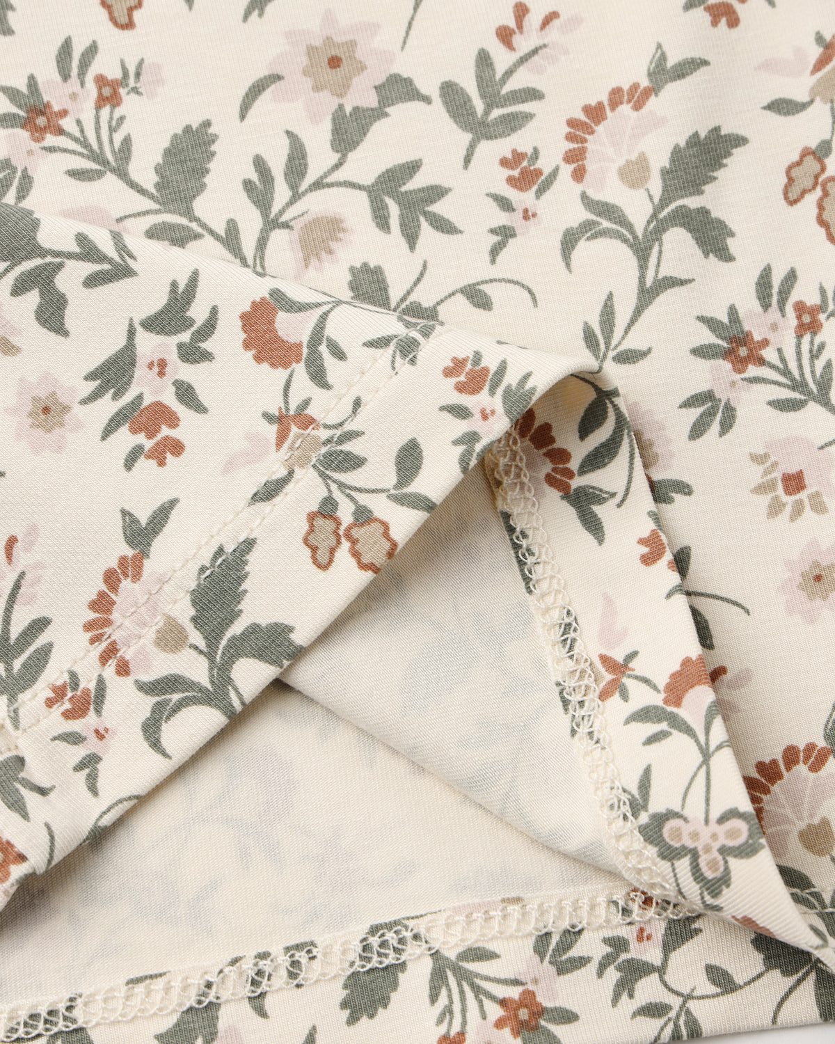 Quincy Mae Baby Bamboo Pajama Set in Holiday Floral Shirt Details