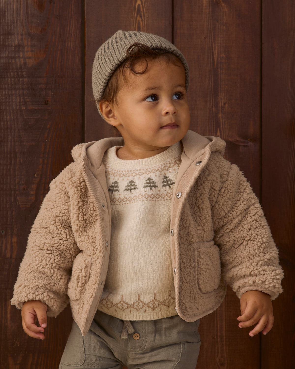 Toddler model wearing Quincy Mae Baby Rex Sweater in Tree Fair Isle Luca Pant in Spruce Beanie in Spruce studio model portrait