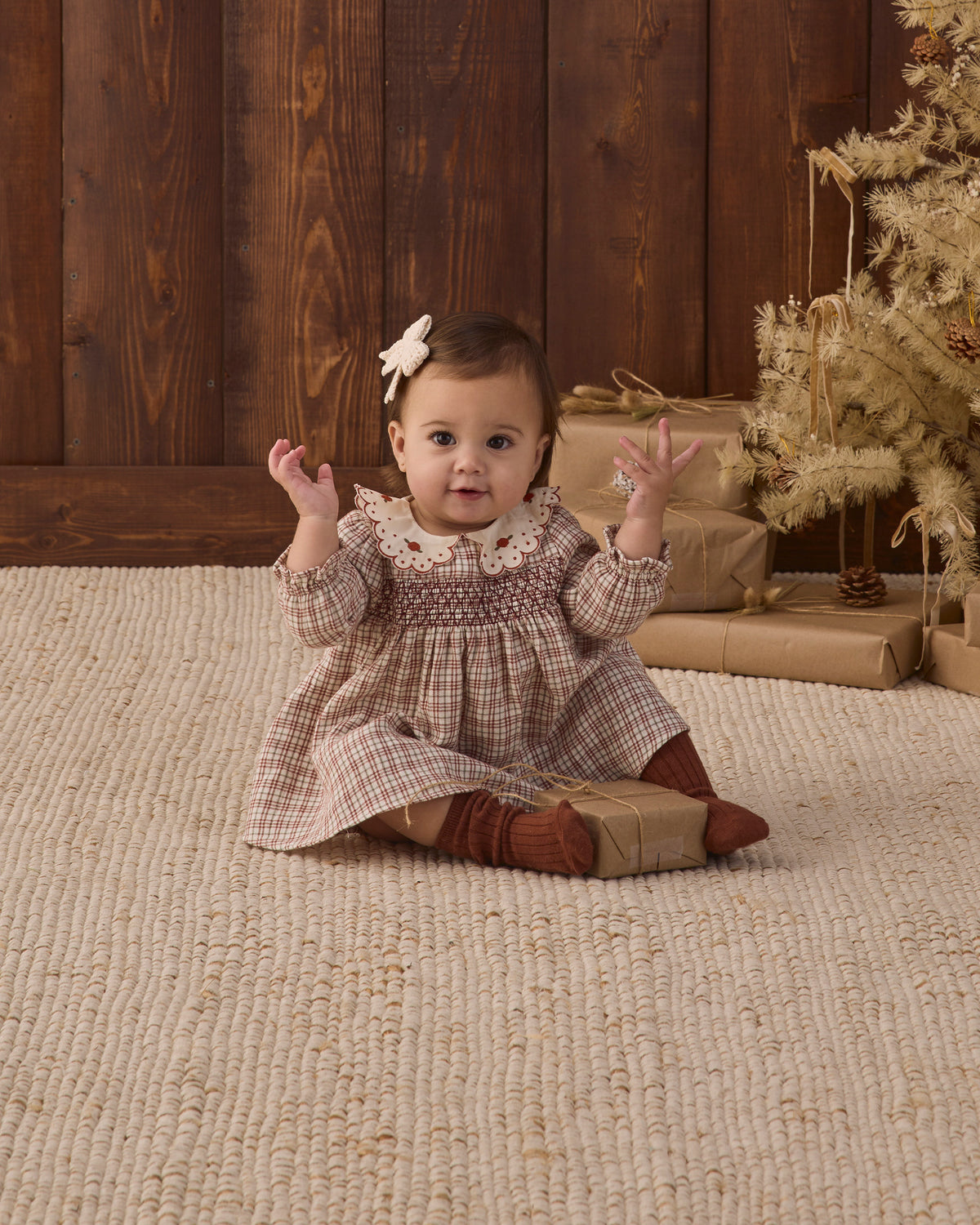 Quincy Mae Baby Callie Dress in Christmas Plaid studio model photo