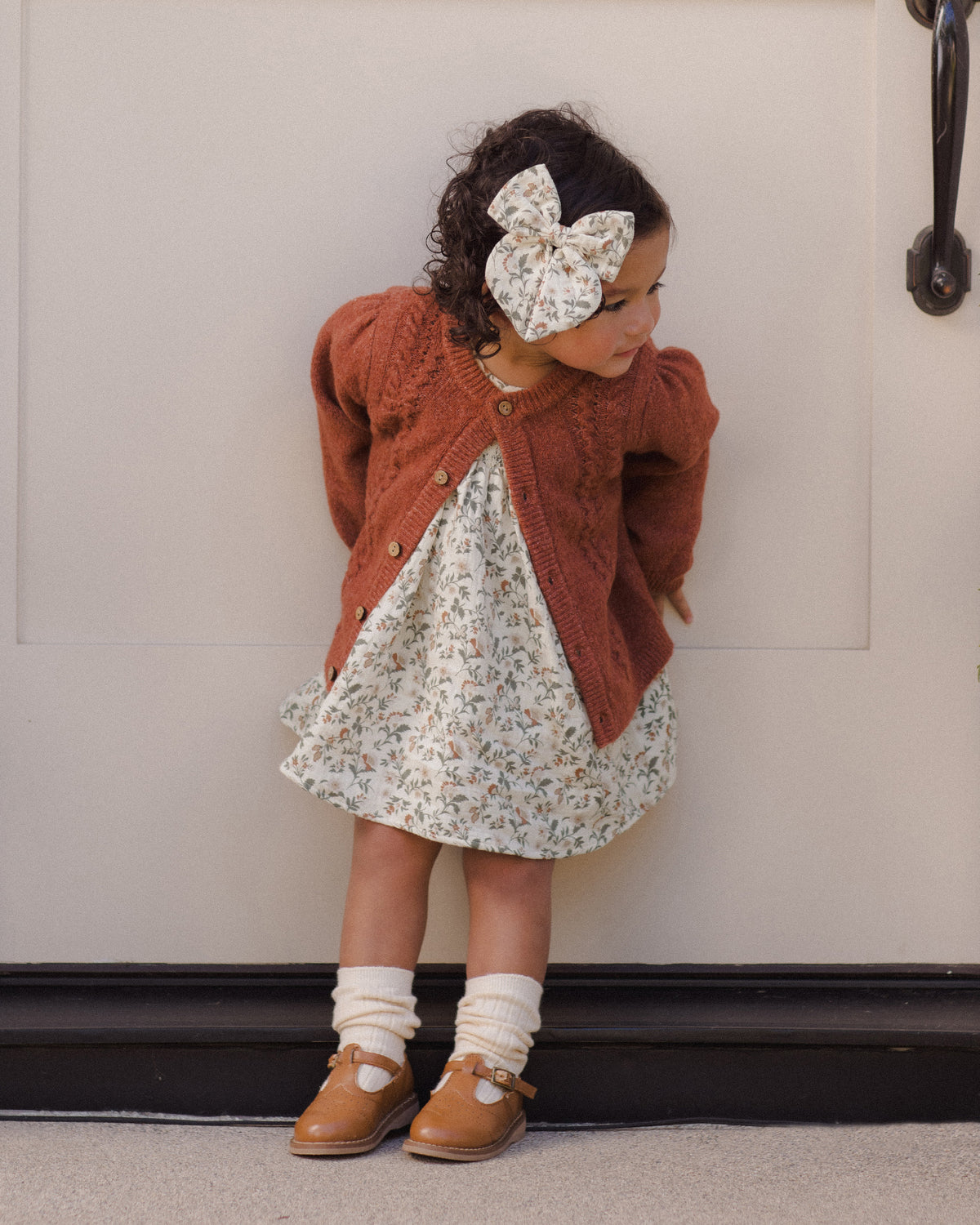 Quincy Mae Carina Baby Dress in Holiday Floral styled model lifestyle photo