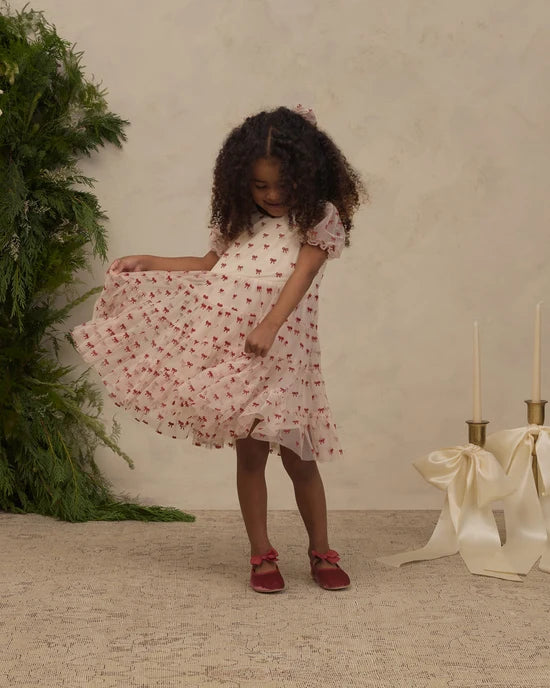 Girl wearing the Noralee Dottie Dress | Ruby Bows