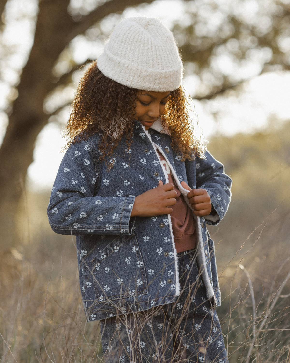 Lifestyle image of a girl wearing the Rylee + Cru Long Chore Coat | Heart Ditsy