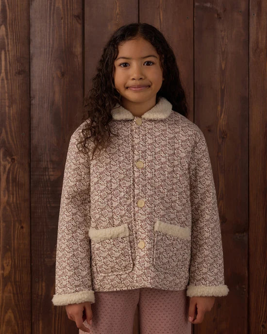 Girl modeling the Rylee + Cru Quilted Chore Coat in Primrose front detail shot