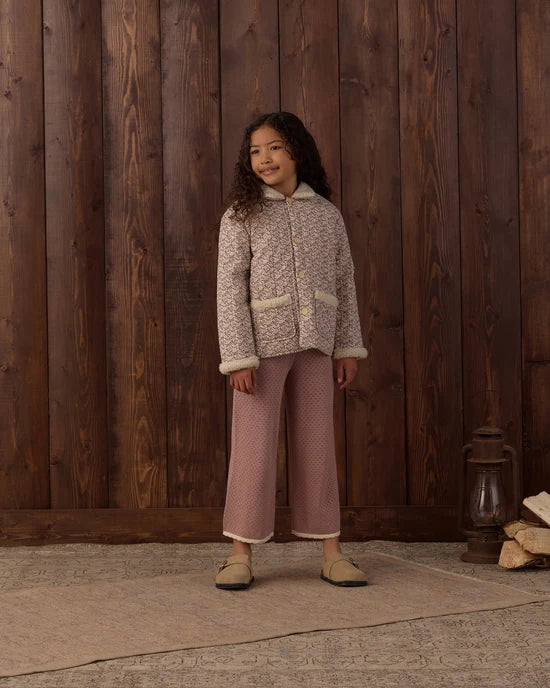Girl modeling the Rylee + Cru Quilted Chore Coat in Primrose