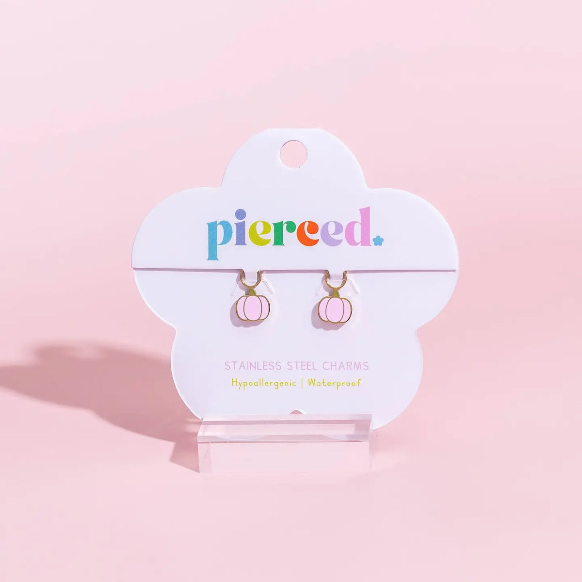Pierced Co. Pink Pumpkin Earring Charm flat lay in packaging