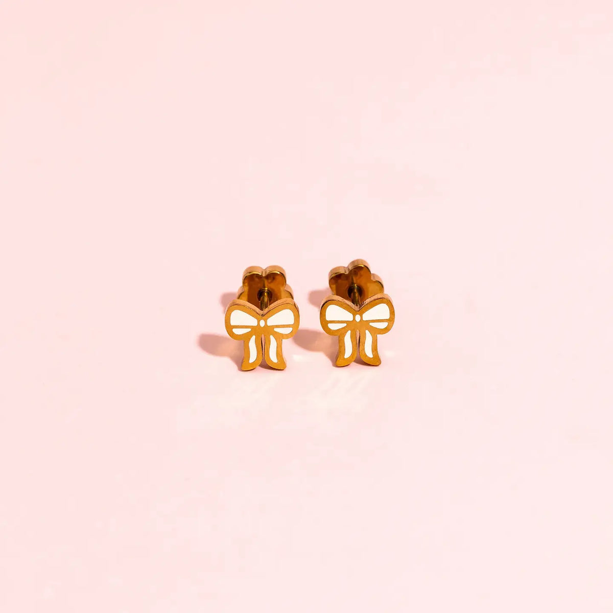 Pierced Co. Cream Bow Earring flat lay