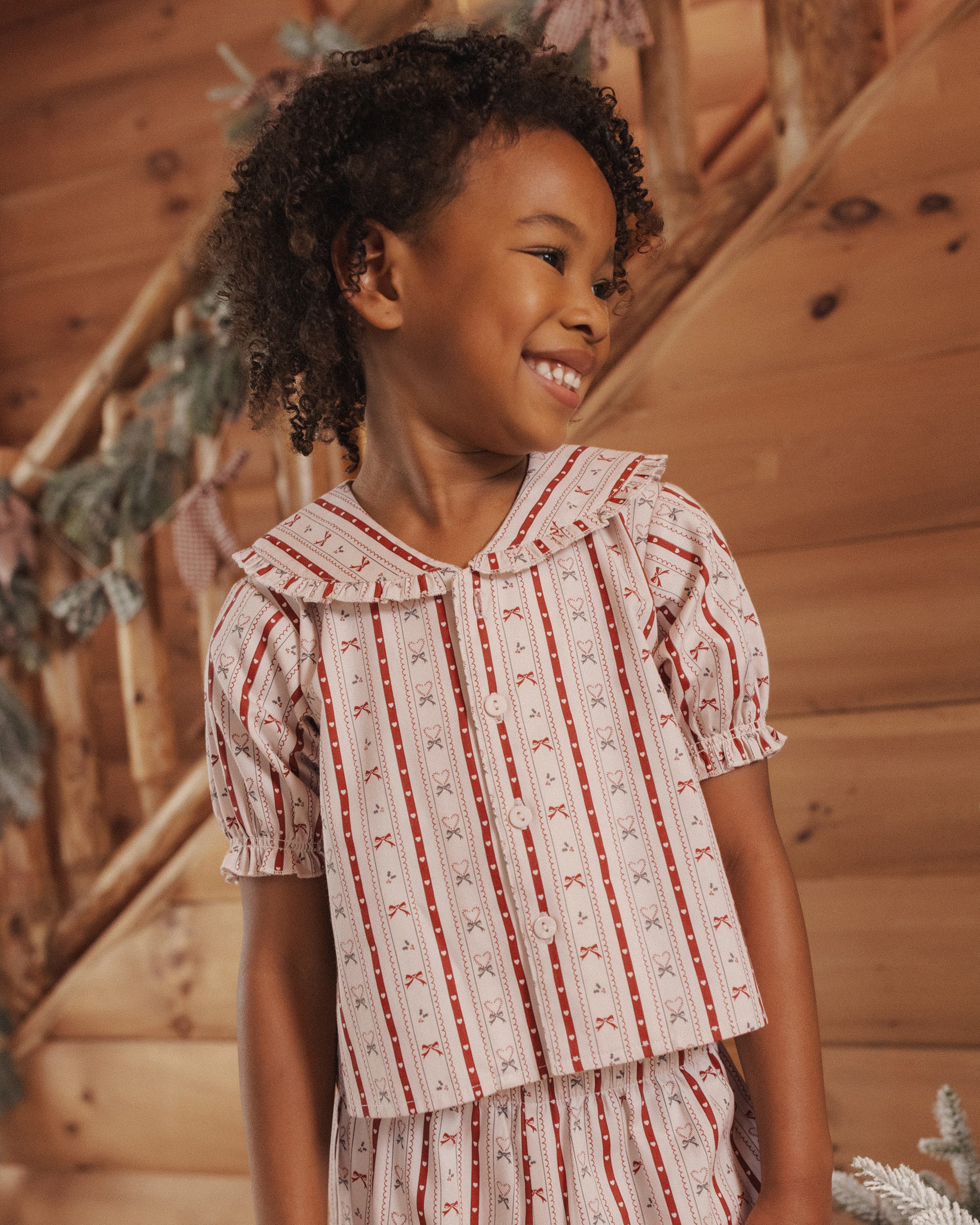 Rylee + Cru Girl's Ruffle Pajamas | Candycane Lane Model Portrait