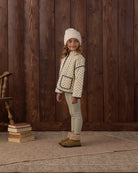 Young girl wearing the Rylee + Cru Quilted Jacket | Vintage Fleur