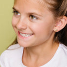 Pierced Co. Cream Bow Earring on model