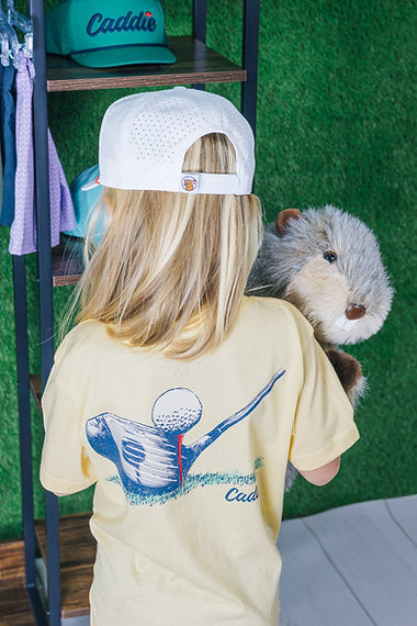 Caddie "Lined Up" Tee | Yellow back to camera model photo
