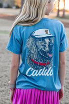 Girl wearing Caddie Retriever Pro Tee in Saltwater Blue RC117Y back to camera angle lifestyle photo