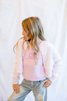 Parfum De fit Cardigan girl looking to the side 