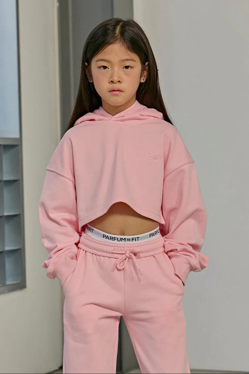 Model wearing the Parfum de Fit Vive Parfum Crop Hoodie