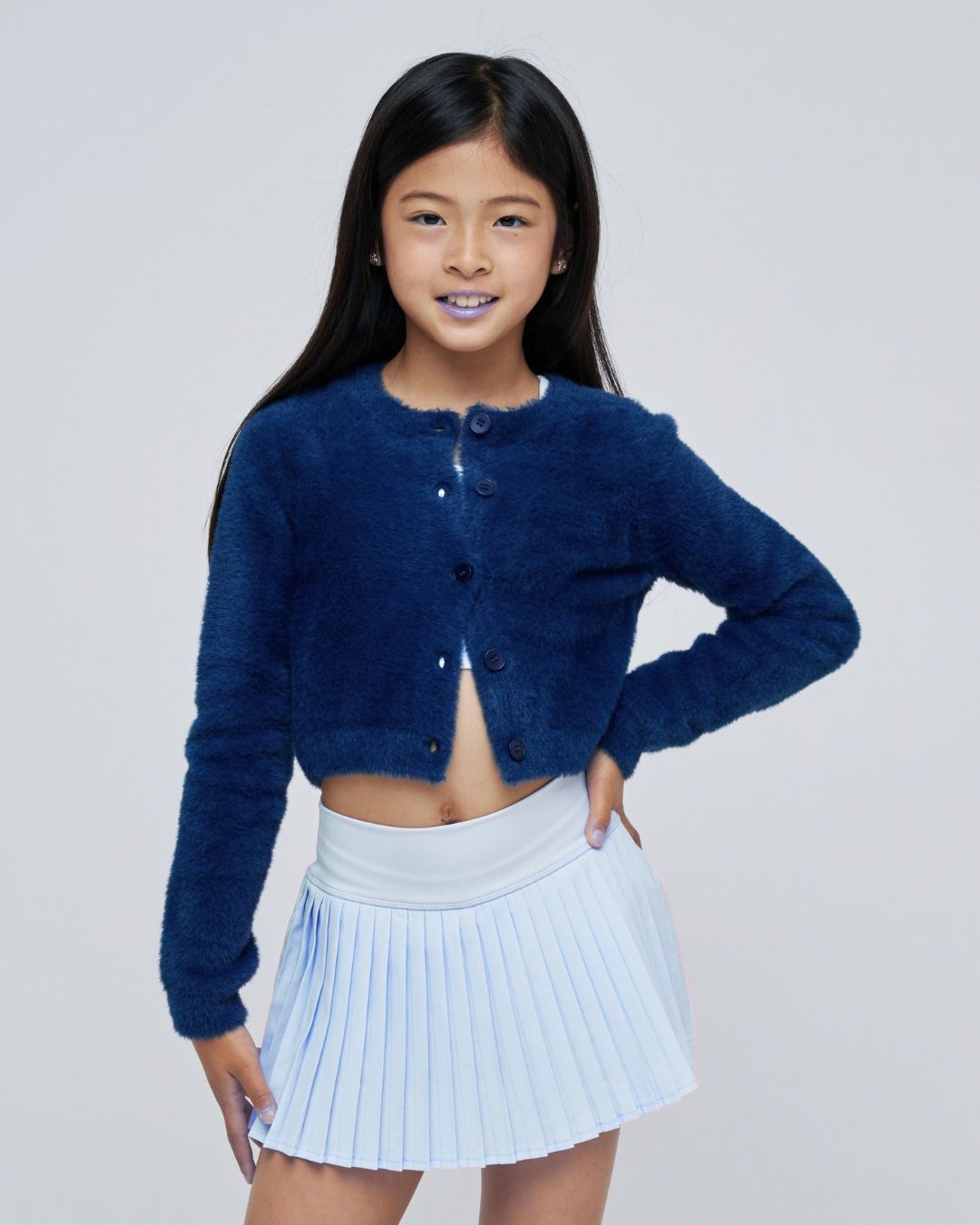 parfum de fit pleated tennis skirt frost on model front pose