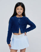 parfum de fit pleated tennis skirt frost on model front pose