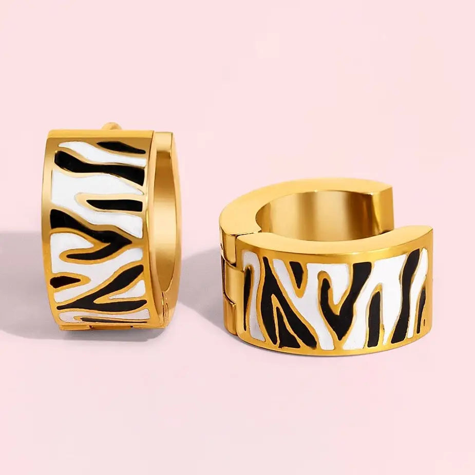 Black and white huggie hoop stripes gold earring Pierced Co. Zebra Stripe Huggies Earrings