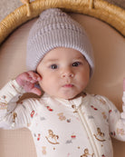 Baby model lifestyle sleep portrait Quincy Mae Baby Bamboo Zip Footie in Toy Chest