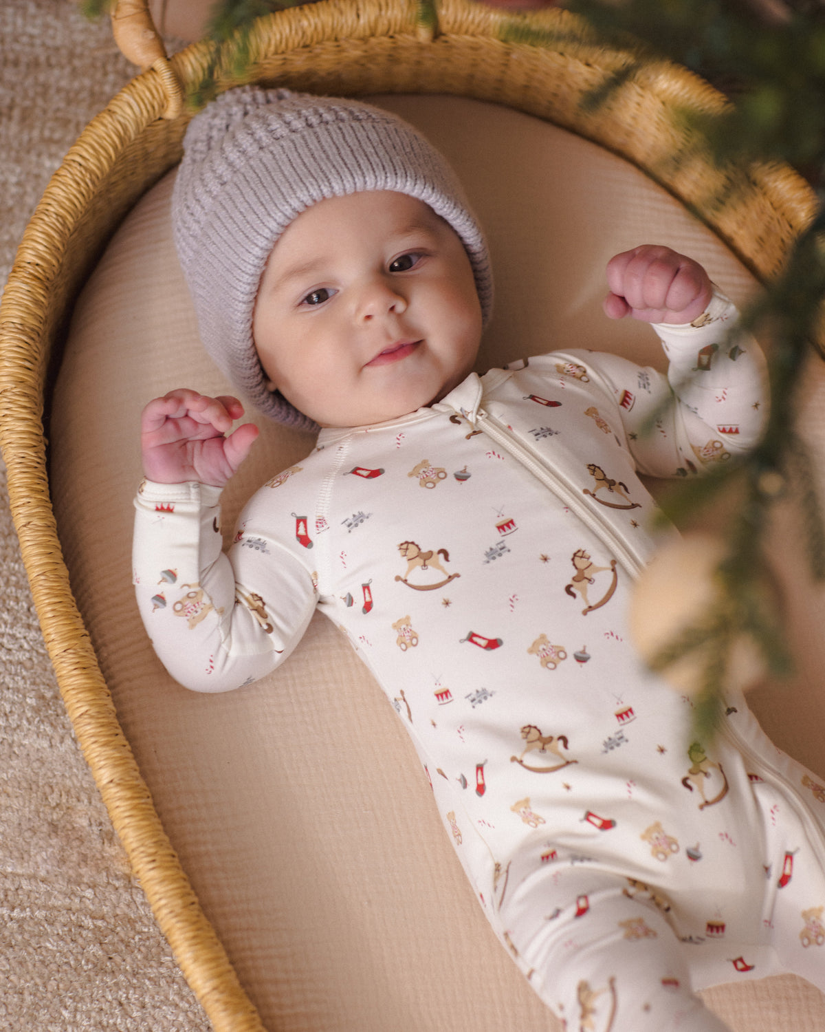 Quincy Mae Baby Bamboo Zip Footie in Toy Chest baby model