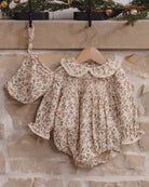 Quincy Mae Callie Romper in Holiday Floral styled outfit photo