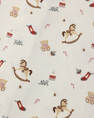Quincy Mae Bamboo Baby Pajama Set in Toy Chest detail shot of "Toy Chest" pattern