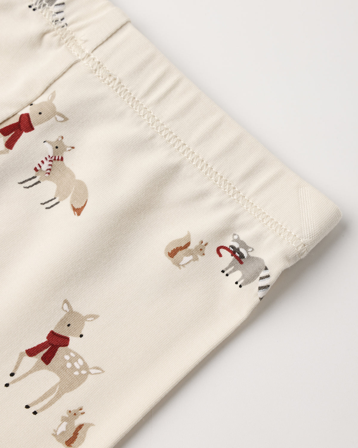 Close up details of pants of Quincy Mae Baby Bamboo Pajama Set in Forest Friends
