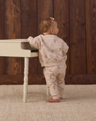Quincy Mae Relaxed Fleece Sweatshirt in Mittens and Quincy Mae Relaxed Fleece Baby Sweatpant in Mittens full length studio model back to camera photo