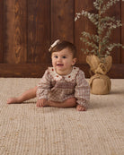 Quincy Mae Baby Callie Romper in Christmas Plaid studio model photo