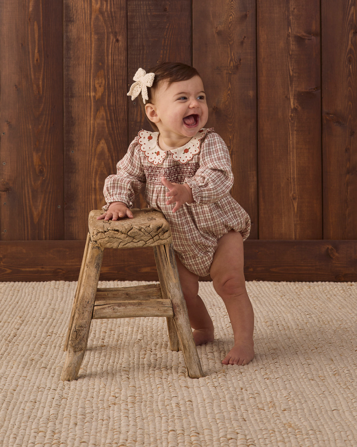 Quincy Mae Baby Callie Romper in Christmas Plaid styled studio model photo