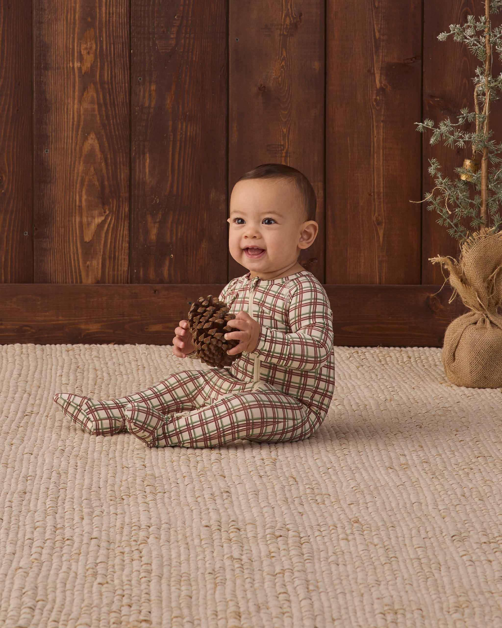 Quincy Mae Bamboo Baby Zip Footie in Redwood Check studio model photo
