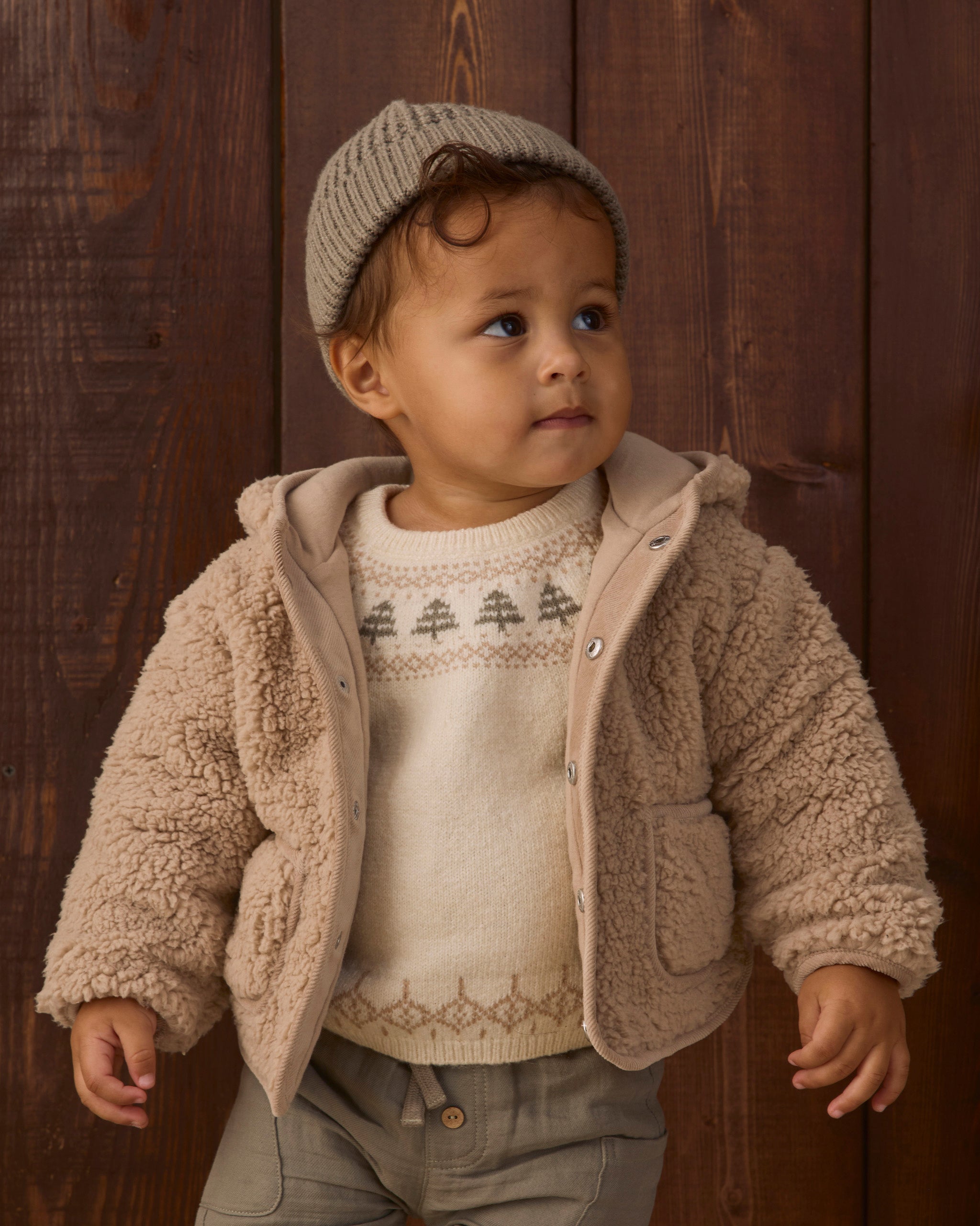 Toddler model wearing Quincy Mae Baby Rex Sweater in Tree Fair Isle Luca Pant in Spruce Beanie in Spruce studio model portrait