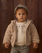 Toddler model wearing Quincy Mae Baby Rex Sweater in Tree Fair Isle Luca Pant in Spruce Beanie in Spruce model portrait