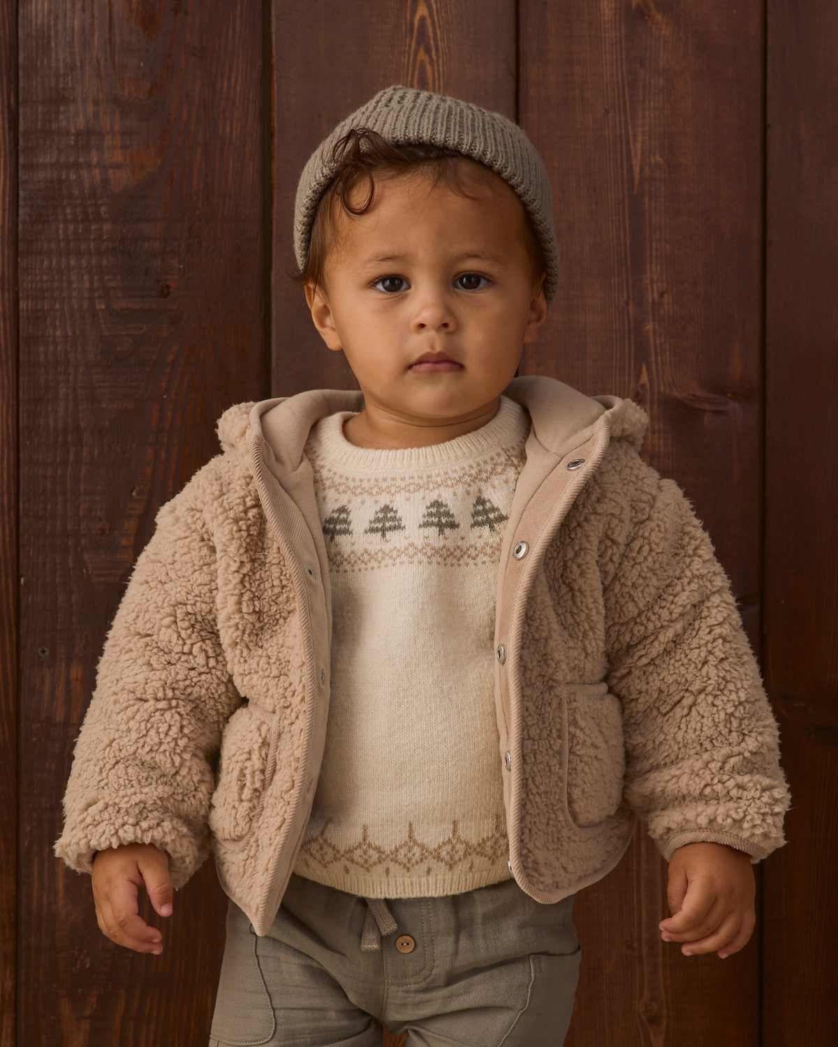 Toddler model wearing Quincy Mae Baby Rex Sweater in Tree Fair Isle Luca Pant in Spruce Beanie in Spruce model portrait