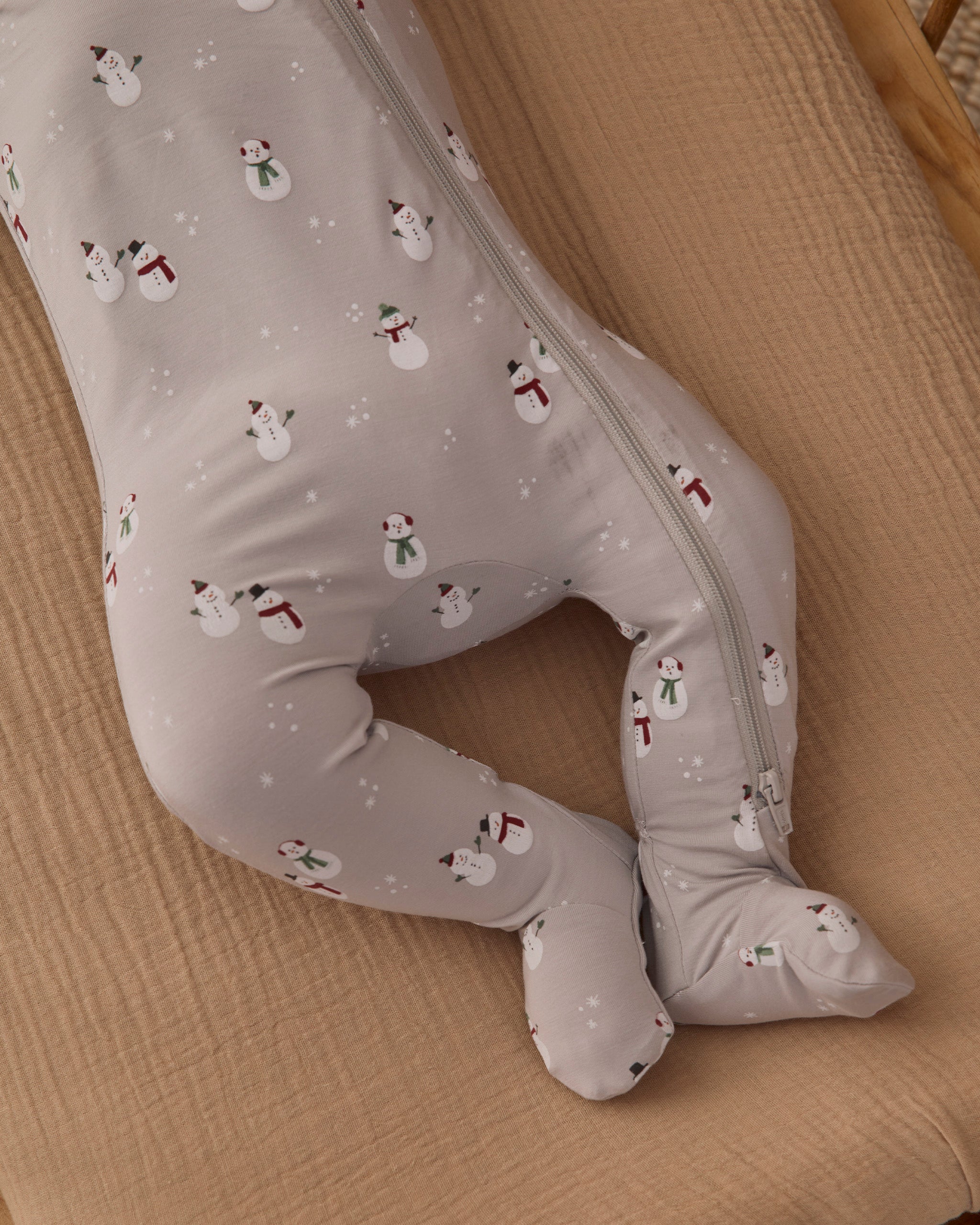 Close up details of Quincy Mae Baby Bamboo Zip Footie in Snowman