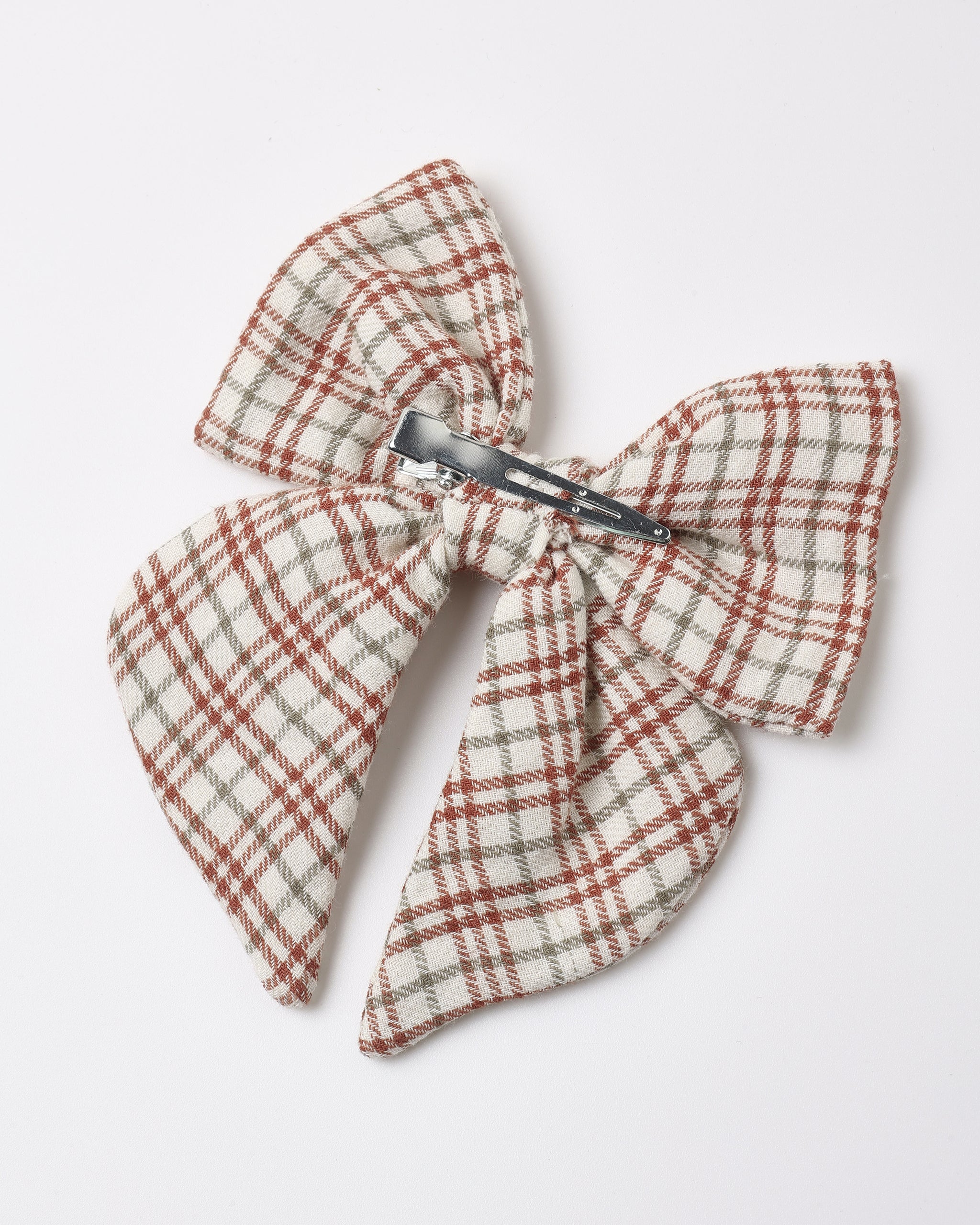 Back side angle of Quincy Mae Baby Bow in Christmas Plaid Flat Lay details 