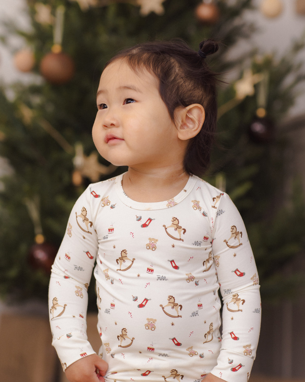 Quincy Mae Bamboo Baby Pajama Set in Toy Chest baby model lifestyle portait