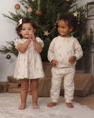 Quincy Mae Darla Dress in Gingerbread, Quincy Mae Relaxed Fleece Baby Sweatshirt in Gingerbread, and Quincy Mae Relaxed Fleece Baby Sweatpant in Gingerbread sibling matching for baby/toddlers boys and girls