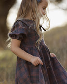 Detail close-up of the Rylee + Cru Camille Dress | Midnight Plaid