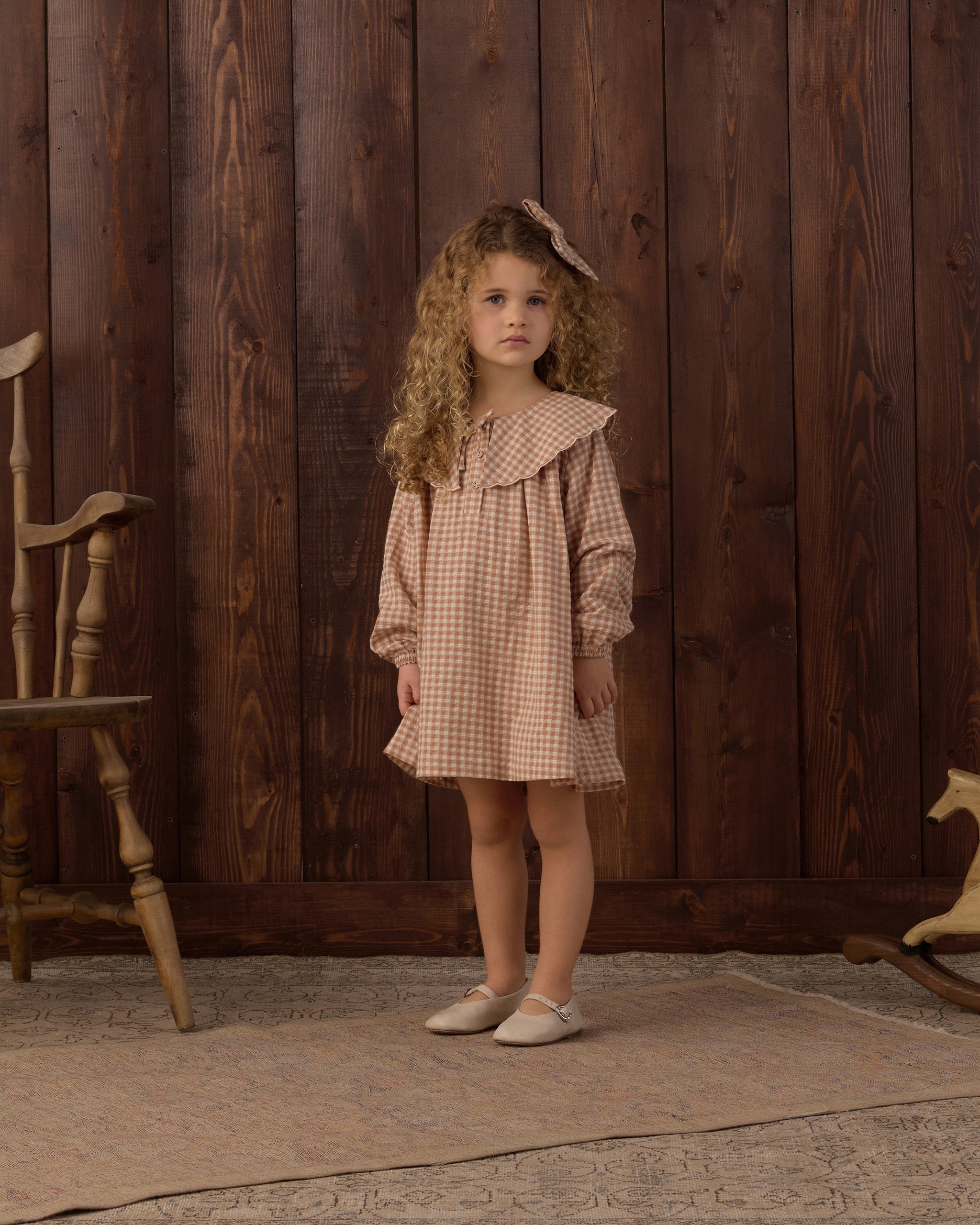 Young girl modeling the Rylee + Cru Collette Mini Dress | Fawn Gingham