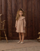 Young girl modeling the Rylee + Cru Collette Mini Dress | Fawn Gingham