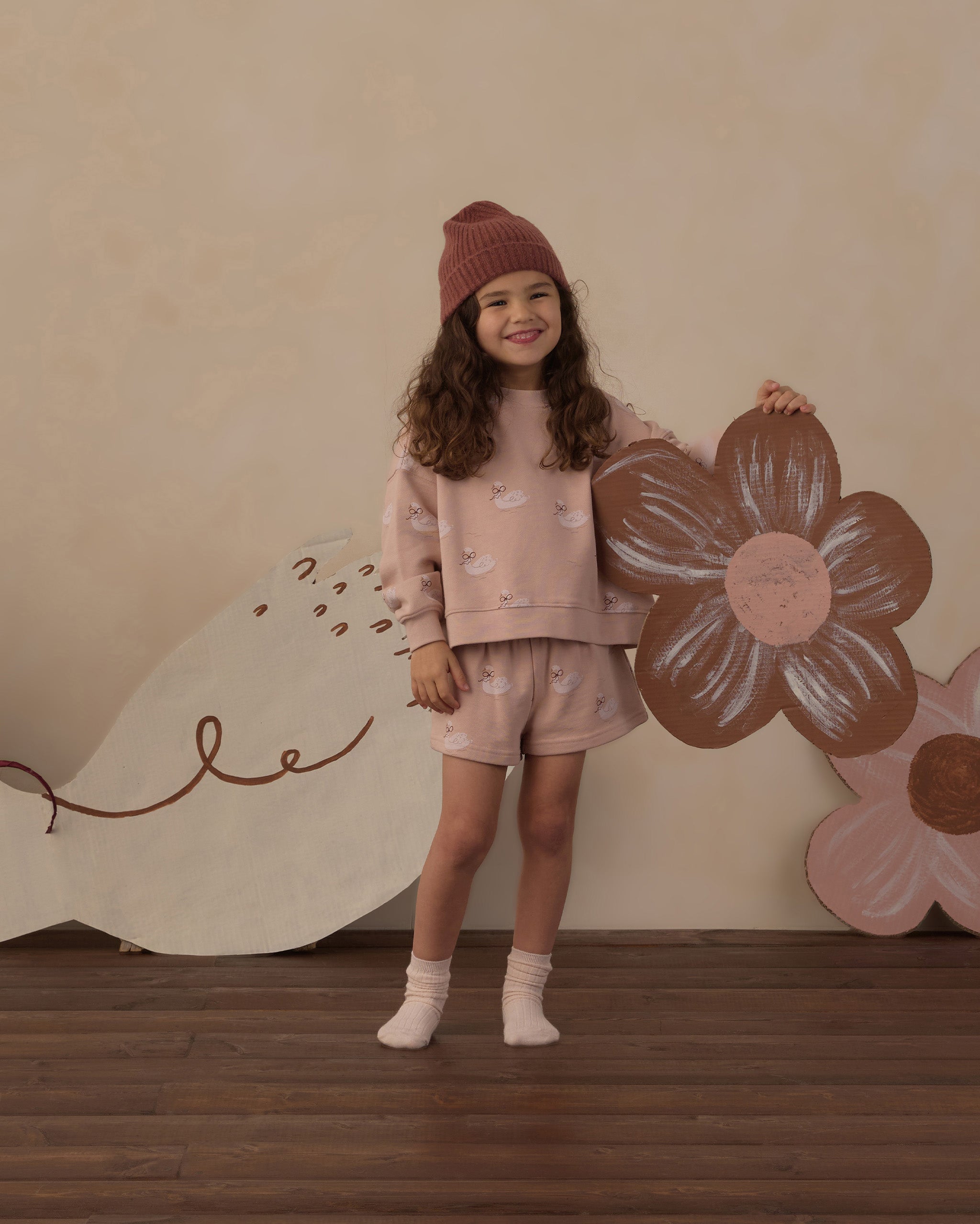 Girl in studio wearing the Rylee + Cru Boxy Pullover | Swans