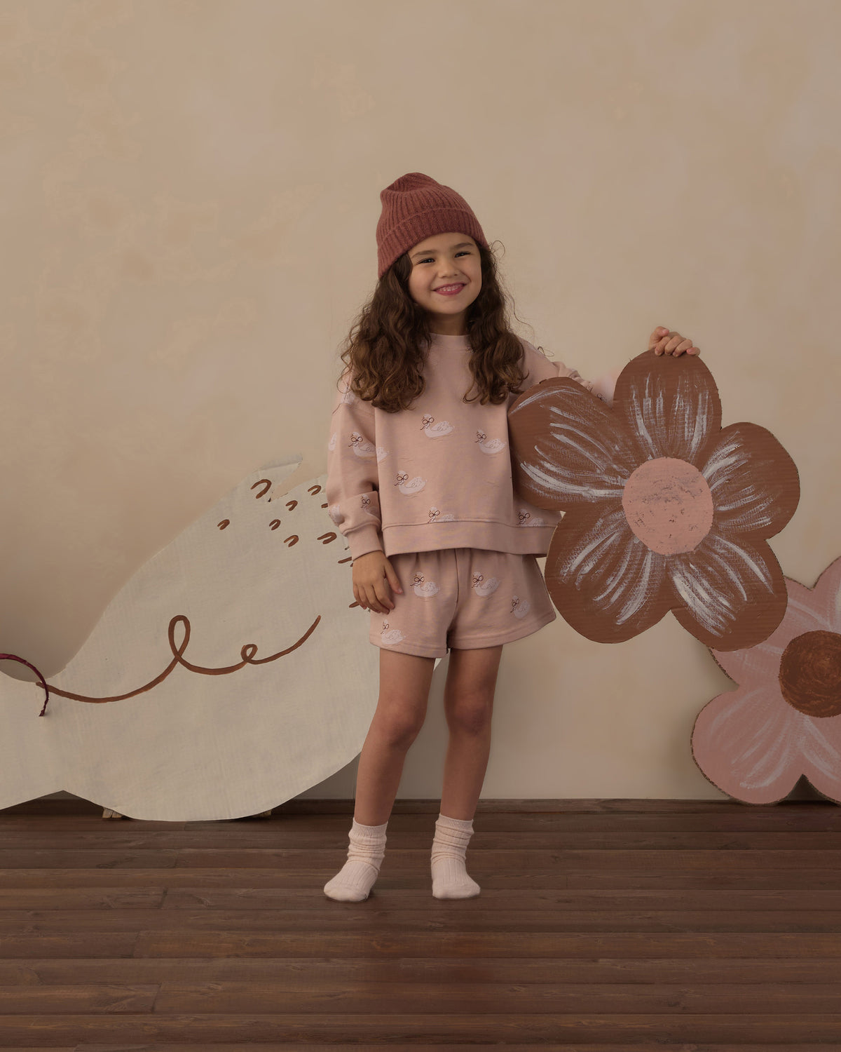 Girl in studio wearing the Rylee + Cru Boxy Pullover | Swans