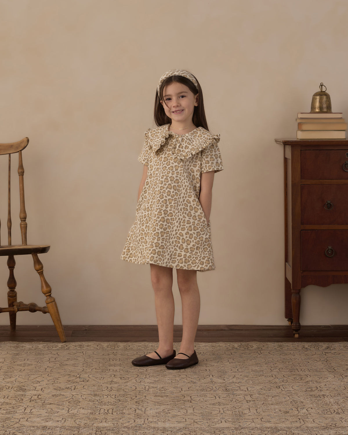 Model wearing the girls's Rylee + Cru Girls Collard Denim Mini Dress | Leopard