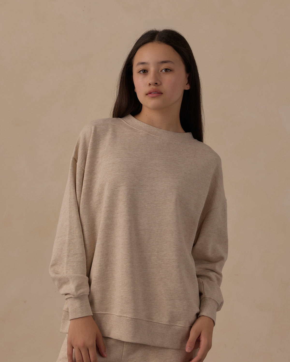 Girl wearing the Rylee + Cru Teen Oversized Mock Neck | Heathered Ash