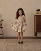 Girl twirling in the Rylee + Cru Sage Jersey Dress | Meadow