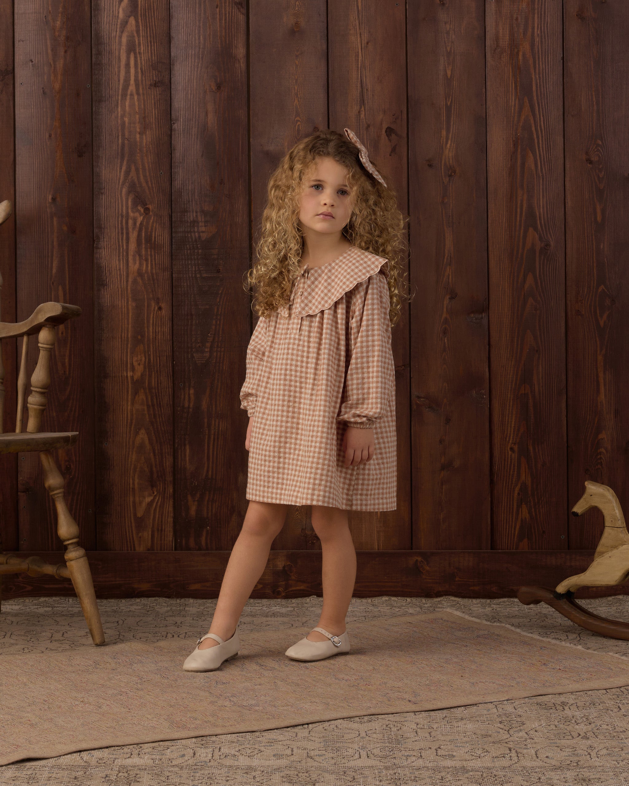 Girl wearing the Rylee + Cru Collette Mini Dress | Fawn Gingham