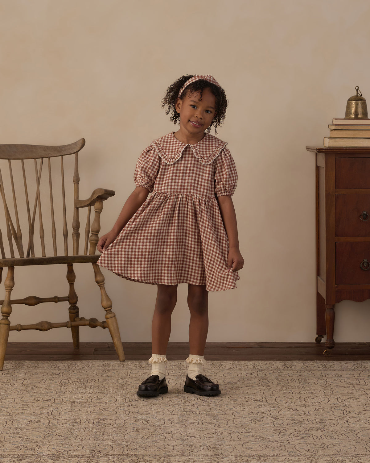 Young girl wearing the Rylee + Cru Camille Dress | Brick Check front